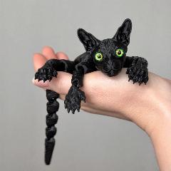 Игрушка антистресс Кот сфинкс подвижный, пластик, черный, 22,5см, зеленые глаза, черный/зеленый, 22.5x3.6 см